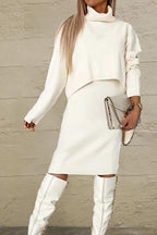 White turtleneck dropped shoulder sweater and dress set with moderate stretch, styled with knee-high boots and clutch bag
