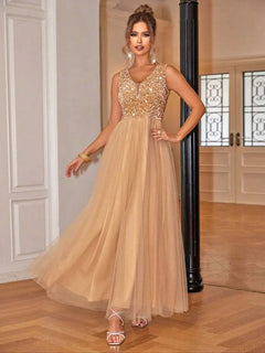 Sequin V-Neck Sleeveless Dress in beige with shimmering bodice, slightly stretchy, lined, and made of 100% polyamide.