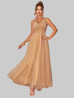 Sequin V-Neck Sleeveless Dress in beige with shimmering bodice, slightly stretchy, lined, and made of 100% polyamide.