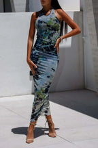 Backless printed halter neck dress with abstract design.
