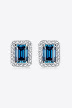 2 carat indigo moissanite stud earrings in geometric sterling silver with platinum plating