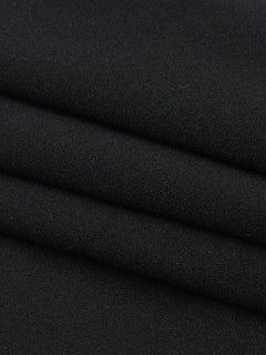 Close-up of black polyester fabric texture for asymmetrical tied sleeveless maxi dress