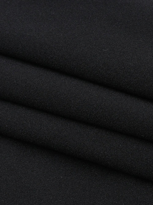 Close-up of black polyester fabric texture for asymmetrical tied sleeveless maxi dress
