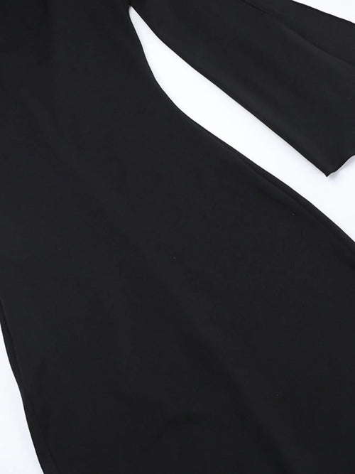 Black asymmetrical tied sleeveless maxi dress made of 100% polyester with no stretch and unlined body.