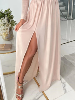 Plus size blush pink full length slit surplice maxi dress with long sleeves and slight stretch