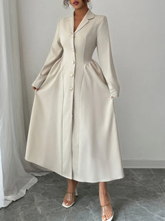 Elegant beige button-front long sleeve dress with ruched waist and tailored fit