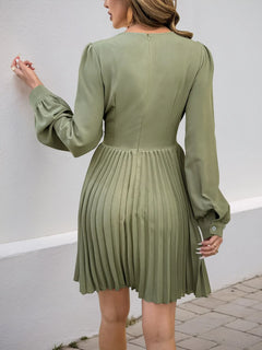 olive green pleated long sleeve v-neck dress with zipper back and slight stretch polyester fabric