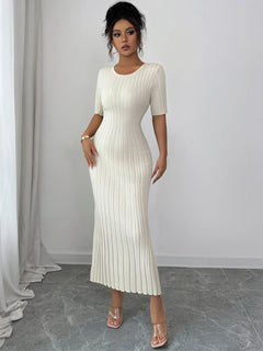 woman wearing white ribbed round neck short sleeve sweater dress midi length