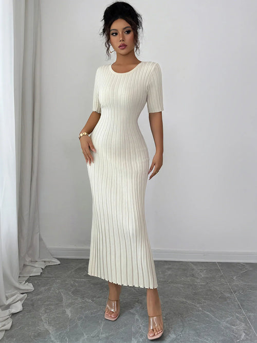 woman wearing white ribbed round neck short sleeve sweater dress midi length