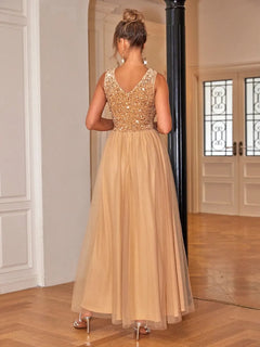 Sequin V-Neck Sleeveless Dress, slightly stretchy and lined, in a luxurious setting.