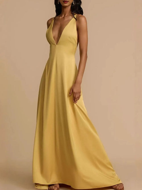 Yellow deep V-neck maxi dress with backless crisscross design and slightly stretchy polyester fabric