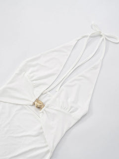 Ruffled hem halter neck mini dress in white with a backless design, made of slightly stretchy polyester.