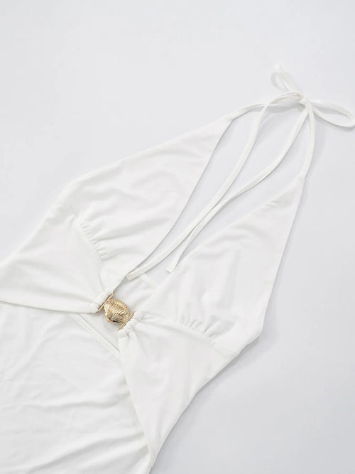 Ruffled hem halter neck mini dress in white with a backless design, made of slightly stretchy polyester.