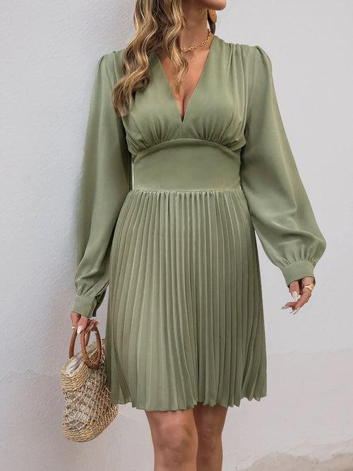 Olive green pleated long sleeve V-neck dress with slightly stretchy polyester fabric and zipper detail
