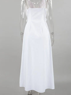 White ruffled V-neck maxi dress made of 100% cotton with a lined body and frill detail