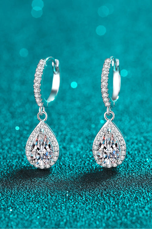 925 sterling silver moissanite teardrop earrings with rhodium plating and zircon accents totaling 2 carats, 1 inch long and 0.3 inch wide