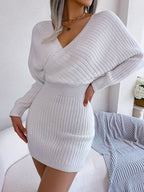 White rib-knit dolman sleeve sweater dress with surplice neckline and A-line mini hem