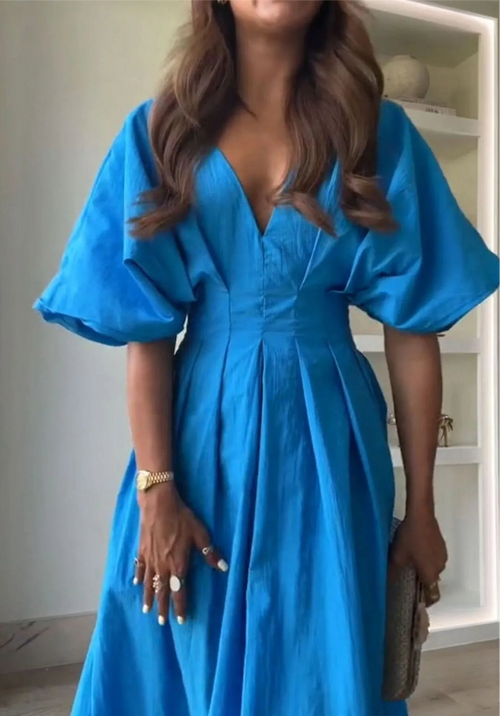 Blue V-neck half sleeve midi dress with ruched detail and puffed sleeves, made of polyester, backless design.