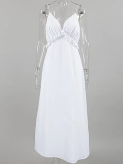 White ruffled V-neck maxi dress with thin straps and cotton lining on clear mannequin