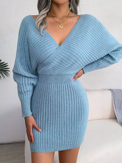 Blue rib-knit dolman sleeve sweater dress with surplice neckline and A-line mini hem.