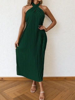 Green pleated halter neck midi dress with tied neckline and no stretch polyester fabric