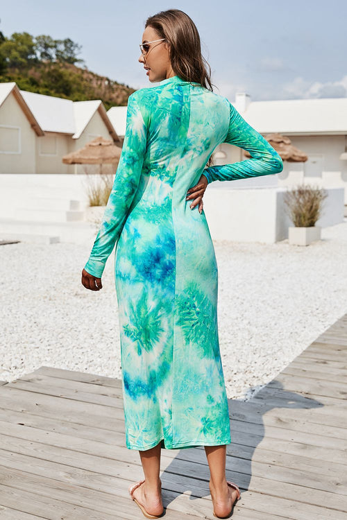 Tie dye mock neck long sleeve midi dress with pencil hem.