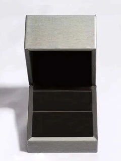 2.16 carat moissanite earrings in 925 sterling silver with 18K gold plating in an open jewelry box