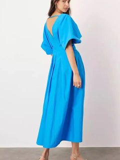 Blue V-neck half sleeve midi dress with ruched backless design and no stretch polyester fabric
