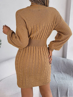 back view of brown cable-knit cutout round neck slit sweater dress with long sleeves and fitted waist