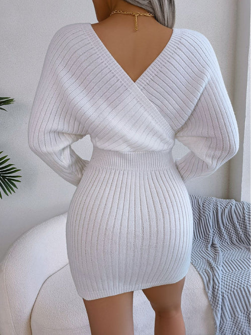 white rib-knit dolman sleeve sweater dress with surplice neckline and a-line mini skirt back view