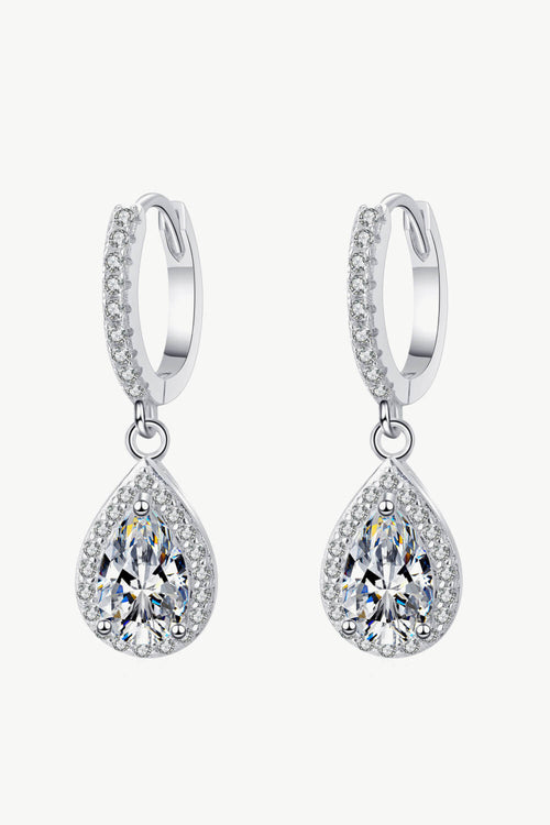 Pair of 1-inch moissanite teardrop earrings with 2 carat total weight, 925 sterling silver and rhodium plating.