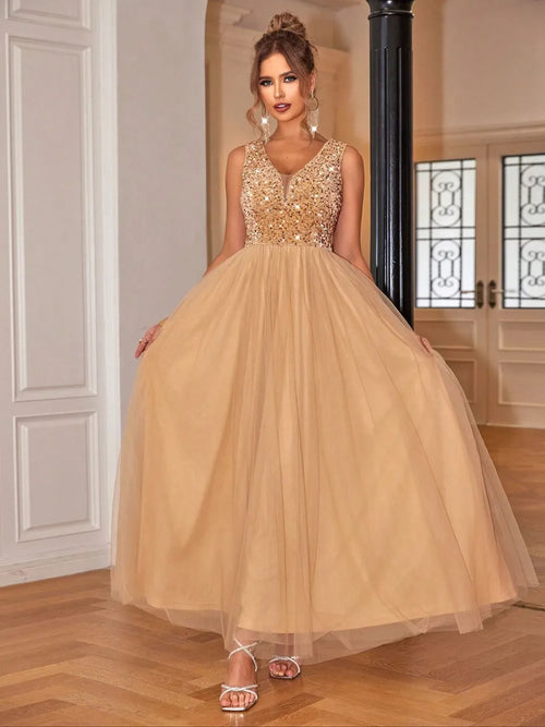 Sequin V-Neck sleeveless dress with a full skirt, featuring a shimmering bodice, perfect for elegant occasions.