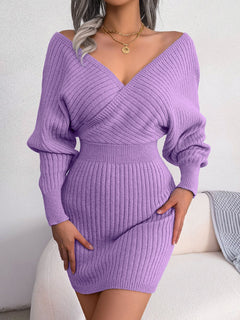 Purple rib-knit dolman sleeve sweater dress with surplice neckline and long sleeves, casual mini dress with ribbed texture and A-line hem.