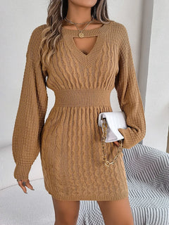 Brown cable-knit cutout round neck slit sweater dress with long sleeves and fitted waist.