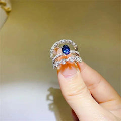 1 carat moissanite sterling silver ring with blue center stone and diamond accents